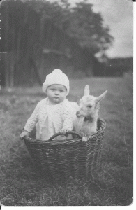 Mum as a baby, with goat